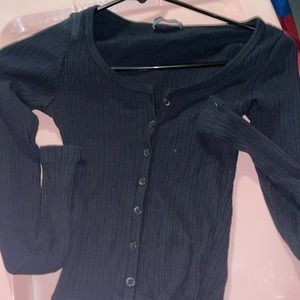 Brandy Melville long sleeve black button up top. Never worn but ripped tags off